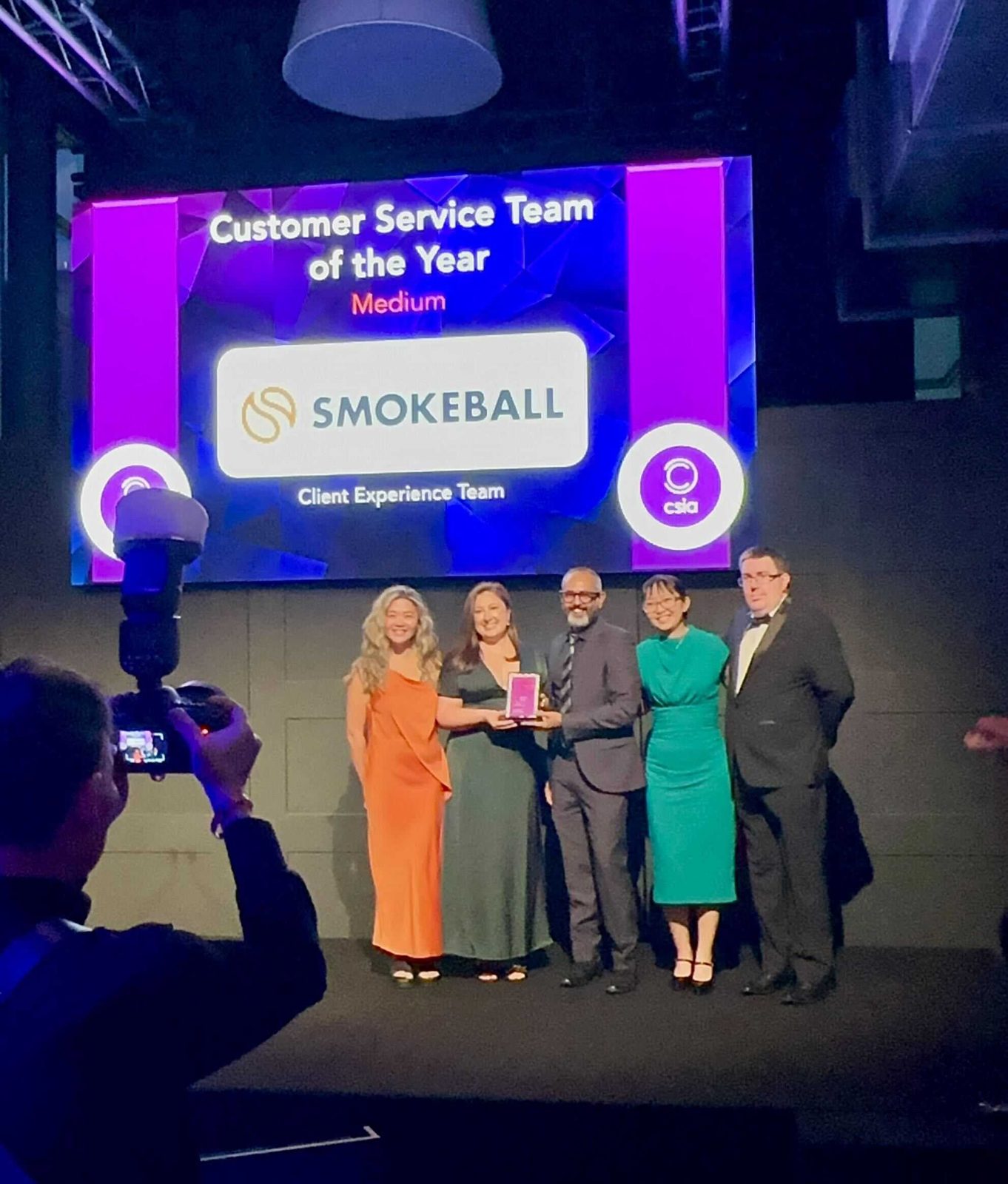 Accepting the CSIA Customer Service Team of the Year award